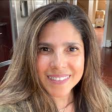 A Michigan librarian sprang into action to help a mother duck and her  ducklings, safely guiding them away from the busy streets of downtown Bay  City and back to a street near