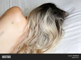 Long blonde hairstyles have always been associated with femininity, grace and elegance. Woman Long Blonde Hair Image Photo Free Trial Bigstock