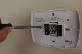 I have a carrier edge thermostat (see link below) and i would like to remove it from the wall to do some painting. How To Change The Thermostat The Art Of Manliness