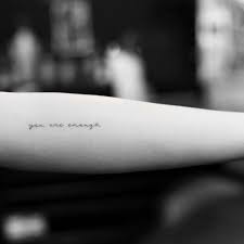A beautifully placed tattoo phrase with a deep meaning. 20 Small But Powerful Inspirational Quote Tattoos