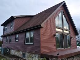 If you have vinyl siding and want to hang pictures on it, such as near a patio or porch area, you need the proper hooks. Log Cabin Remodel Vinyl Siding Install York Springs Pa Jwe Remodeling