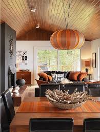 4 Chic Rooms With Black Orange Color Schemes That Aren T Just For Halloween Living Room Orange House Design Home Decor
