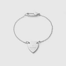 Gucci Heart Bracelet With Gucci Trademark Silver Earrings Outfit Jewelry Bracelets Silver Gucci Bracelet