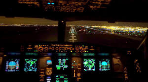 Boeing 777 cockpit stock photos and images. Video Cockpit View Of A330 Landing By Night At Paris Cdg Airlive