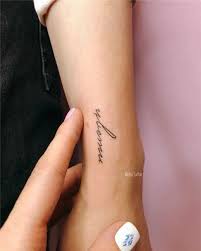 Not clear enough to be read; Tattoo Illegible Inscription Small Tattoos Small Tattoo Designs Tattoo Designs