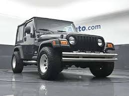 Image result for Brilliant Black 2005 Jeep
