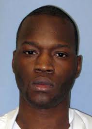 Fired prison supervisor facing trial in inmate beating death, cover-up