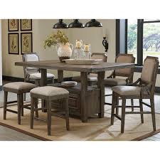 Get free shipping on qualified kitchen island kitchen islands or buy online pick up in store today in the furniture department. Signature Design By Ashley Wyndahl 7 Piece Counter Height Dining Set In Rustic Brown Nebraska Furniture Mart