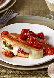 Mozzarella Basil Chicken With Roasted Tomatoes Chicken Breasts Are Stuffed With Fresh Basil Melty Mozzarella And Sun Dried Tomato Food Kraft Recipes Recipes