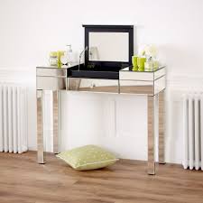 It opens to reveal a large mirror and a set of drawers and box shelves for storing makeup and hygiene products. Venetian Mirrored 1 Drawer Dressing Table With Built In Vanity Mirror The Furniture Market