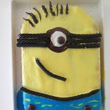 I have seen way too many cake boss episodes and forget that i don't have a 20 person staff to help me out. Minion Sheet Cake Recipe Blog Zak Designs