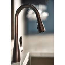 An oil rubbed bronze kitchen faucet is an excellent centerpiece of your kitchen's design. Moen Arbor Single Handle Pull Down Sprayer Kitchen Faucet With Power Boost In Oil Rubbed Bronze 7594orb The Home Depot