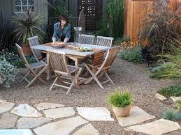 15 Great Ideas For A Lawn Free Yard Flagstone Patio Design Pebble Patio Lawn Free Yard