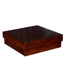 Baker recommends this boxy coffee table, which she says would work just as well in a contemporary room as in one that leans more traditional. Solid Wood Square Contemporary Platform Unique Coffee Table