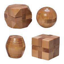 This wooden puzzle takes about an hour to build, and it's way easier to build than it is to solve! Set Of 4 Natural Wood Wooden Puzzles Bits And Pieces