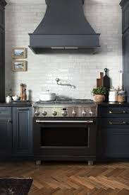 First kitchen cabinets going dark, then bathrooms, and now living rooms, dining rooms, bedrooms, all moving over to the dark side. Our Dark Moody Kitchen Reveal Room For Tuesday Kitchen Layout Kitchen Renovation Kitchen Design