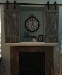 Here We Transformed Our 1990 S Over The Fireplace Tv Hole Into A 2016 Barn Door Feature Fireplace Remodel Above Fireplace Ideas Country Fireplace