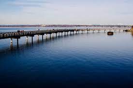 It boasts many great schools, restaurants, and beautiful sights. Bellingham Boardwalk Photograph By Monte Arnold