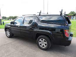 I also saw a rag top made from auto comfortable type material. 2007 Ridgeline Leer 100xq And Roof Racks Topperking Topperking Providing All Of Tampa Bay With Quality Truck Accessories