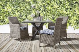 With the table, 4 coordinating dining chairs are also included, with the chair seats matching the table top's rustic weathered wood. Mayfair Outdoor Wicker 5 Pc Dining Set 77800 Dinset By South Sea Rattan American Rattan