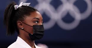 Simone biles, of the united states, watches gymnasts perform after she exited the team final with apparent injury, at the 2020 summer olympics, tuesday, july 27, 2021, in tokyo. A93sh3m1pvp8vm