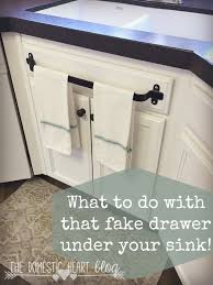 But you need it handy and you need it to dry. Kitchen Dish Towel Holder Bar Over Cabinet Door Hanging Rack Under Sink Hanger Home Improvement Plumbing Fixtures