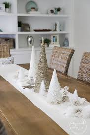 Make sure to decorate the tree and still maintain that natural look. White Christmas Decor Ideas Dining Room Foyer Artsy Chicks Rule