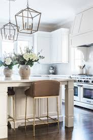 The dark wood floor makes the rustic atmosphere even more prominent too. White And Wood Modern Farmhouse Kitchen Ideas Pickled Barrel