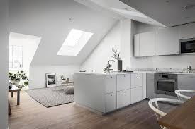 This next example is even more colorful with deep sage green cabinetry and a mustard yellow refrigerator. Interior Trends Scandinavian Minimalism In The Kitchen Design In 2021 White Kitchen Interior Minimalist Kitchen Design White Kitchen Design