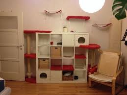 15 Easy Hacks For People Who Love Their Pets Use An Ikea Kallax And Some Floating Shelves To Create A Cat Palace Ikea Cat Cat Tree Cat Furniture