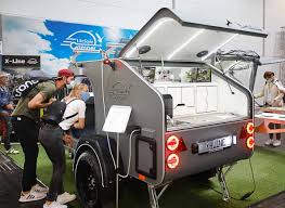 Envie de partir en vacances sur les routes? Salon De La Caravane De Dusseldorf Campings Pour Tentes Et Caravanes