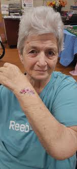 It's all part of our mission to bring joy, self-expression, and a little  playful fun to everyday life. 💜 Check out these snapshots of our awesome  residents rocking their new ink on