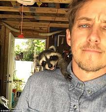 Scientist Wes Larson hugs polar and black bears for a living