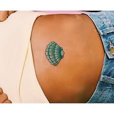 Want to see more posts tagged #seashell tattoo? 26 Pretty Tattoos Fit For A Real Life Mermaid Mermaid Tattoos Seashell Tattoos Shell Tattoos