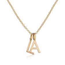 Our diverse collection of charms for bracelets and necklaces welcomes you to personalize a tiffany piece with your own point of view. Yellow Gold Initial Charm Curated Los Angeles