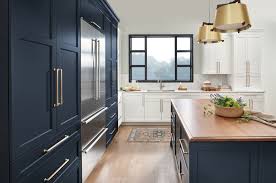 Such a beautiful navy blue and white contrast usage! Blue Kitchen Cabinets A Trending Design Wellborn Cabinet Blog