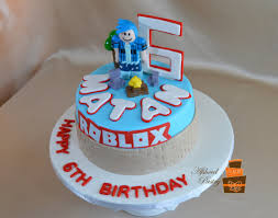 It's zieke's 6th birthday and he requested a. Roblox Birthday Cake