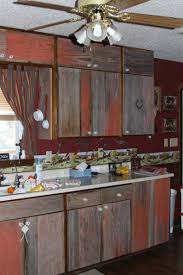 Love how rustic and homey it is! Barn Board Cabinet Doors Rustic Kitchen Cabinets Rustic Kitchen Cabinet Doors