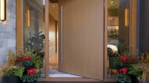A metal door with hardwood backgrounds or a hardwood door with a metal framing. Modern Front Door Ideas Entry Doors With Modern Style