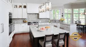 Kitchen islands come in different styles such as breakfast bars with an elevated counter top. Incorporating Seating Into A Kitchen Island Normandy Remodeling