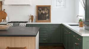 Large inviting kitchen separating the island and clean up area from the cooking zone which designed with costa esmeralda green granite kitchen countertops and cameo white paint color cabinets. 21 Best Green Kitchen Cabinet Ideas