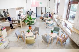 This Trendy Coffee House And Bookstore In Poznan Was An Old Milk Bar Cafe Interior Design Coffee House Interiors Coffee Shop Interior Design
