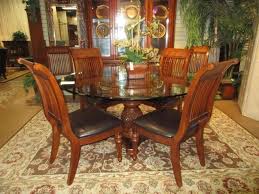 Cindy Crawford Key West Dining Table With Six Chairs This Table Has A 60 Round Glass Top Set On A Carved Pineapple Base Dining Table Key West Dining Glass Top