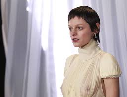 Emma Corrin Freed the Nipple in a Butter Yellow Gown