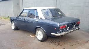 Image result for Medium Gray 1969 Datsun