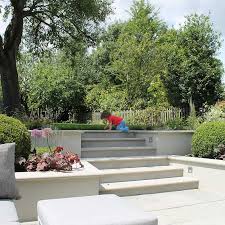 Garden Design In London By The Garden Builders In Surrey Sussex Kent Hampshire Berkshire Hertfordshire Sloped Garden Orchard Garden Family Garden