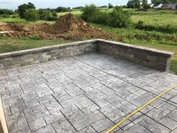 Commercial concrete stamps and flex mats (skins) are used to imprint patterns on concrete to produce the look of natural stone, wood, tile and other finishes. Decorative Concrete Stamped Concrete Tinted Concrete