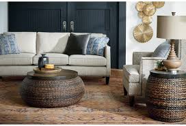 Find a coffee table that's perfect for movie night with the family, an end table that can accentuate the style of a room, and even trunks and chests that offer both a tabletop and storage. Hammary Hidden Treasures Round Basket Cocktail Table With Wood Top Wayside Furniture Cocktail Coffee Tables