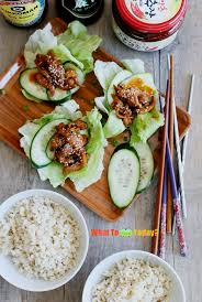 A flour tortilla is filled with sweet, spicy chicken simmered in salsa, and rolled with a cucumber, honey, and pepper mayonnaise. Korean Chicken With Lettuce Wrap