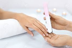 Nageldesign heidelberg, nagelmodellage vom profi in der fußgängerzone ✓ neumodellage und auffüllen ✓ neueste technologien. Nail Care Closeup Of Female Hands Filing Nails With Professional Nail File In Beauty Nail Salon Close Up Of Beautician Hands Doing Perfect Manicure On Woman S Hands Nail Hygiene High Resolution Stock Photo